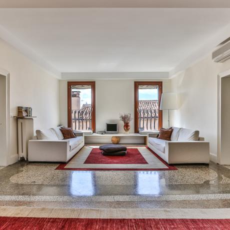 The sunny living room at Ca' dell'Angelo apartment