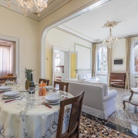 The elegant living room with terrazzo floor at Barbaria Terrace apartment