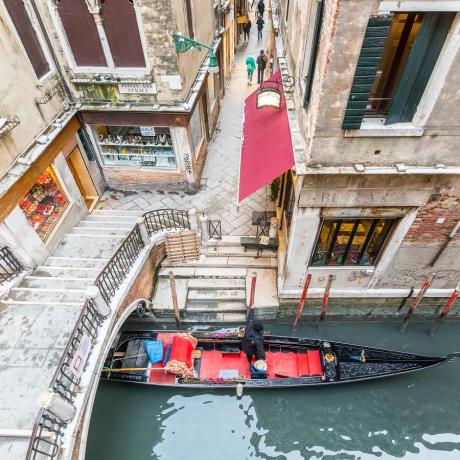 Canal view and gondola just below Ca' Francesca apartment