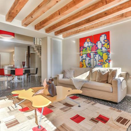 The sunny and stylish living room at Ca' del Redentore apartment