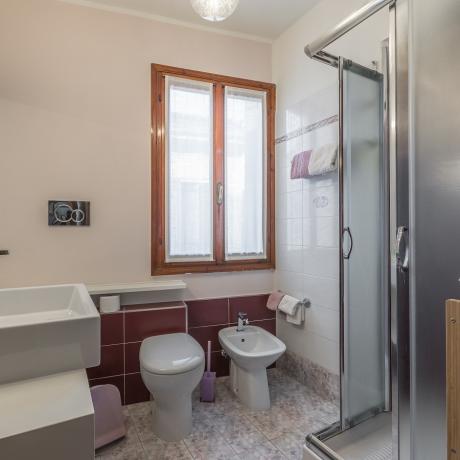 A modern bathroom makes you feel home even in a smaller flat - this is Ca' Isabella!